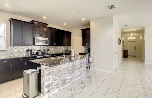 Kissimmee House | 4766 - 5 Bedroom Pool Home in Storey Lake Resort Under 10 Minutes to Disney