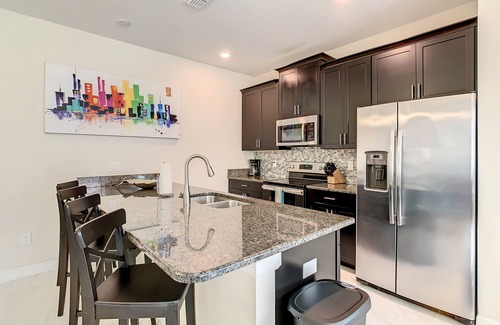 Kissimmee House | 4874 - 5 Bedroom Townhome with Private Pool in Storey Lake Resort Under 10 Minutes to Disney