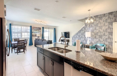 Kissimmee House | 4874 - 5 Bedroom Townhome with Private Pool in Storey Lake Resort Under 10 Minutes to Disney