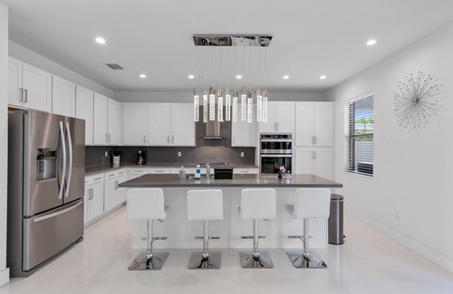 Ludlam Villa | 4BR/4BTH Miami Oasis: Stylish Retreat w/BBQ & Trampoline - Near Beach & Airport