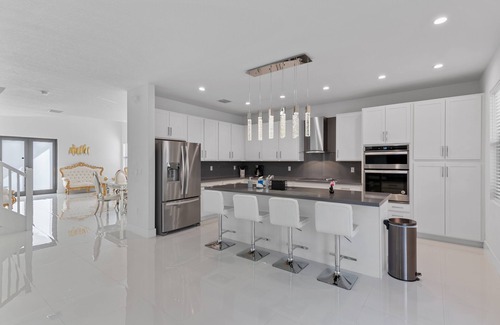 Ludlam Villa | 4BR/4BTH Miami Oasis: Stylish Retreat w/BBQ & Trampoline - Near Beach & Airport