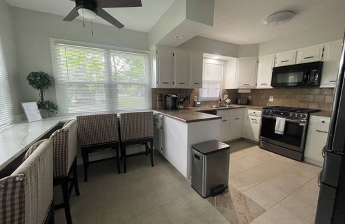 Navarre House | 5 Bedroom family oriented home. Fenced yard, Adjacent park.