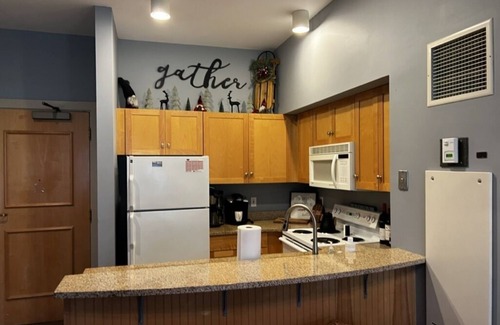 Stratton Mountain Condo | 5 minute walk to lifts and Stratton Village! Cozy fireplace with a private patio