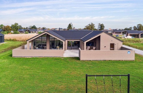 Hasmark Strand House | 5 star holiday home in Otterup