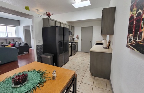 Northeast Heights House | 50% off Getaway 2 "The Canary" A Luxury 3 Bedroom W/ Private Hot Tub & Fire pit!