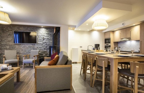 Lanslevillard Apartment | 50m from ski slopes, fitness, swimming pool, sauna, hammam, balcony, fireplace or stove, tv