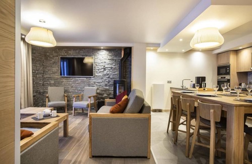 Lanslevillard Apartment | 50m from ski slopes, fitness, swimming pool, sauna, hammam, balcony, fireplace or stove, tv