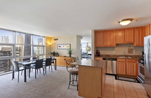 Downtown Chicago Apartment | 52nd Floor MagMile Penthouse VIEWS Fireplace Pool