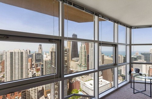 Downtown Chicago Apartment | 52nd Floor MagMile Penthouse VIEWS Fireplace Pool