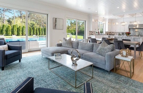 Shinnecock Hills House | 6,400 square foot traditional-style home with a private pool and sweeping...