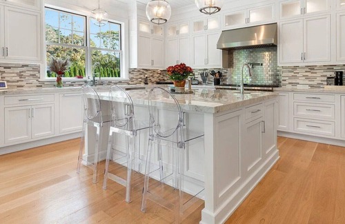 Shinnecock Hills House | 6,400 square foot traditional-style home with a private pool and sweeping...
