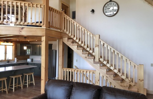 Gilbertsville Cabin | 6 Bedroom Waterfront Log Home with EV charging!