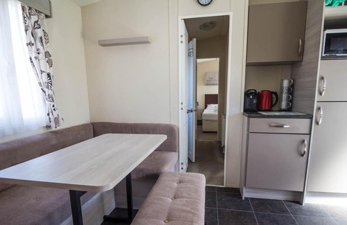Felixstowe House | 6 berth caravan with decking and WiFi at Suffolk Sands Holiday Park ref 45082C
