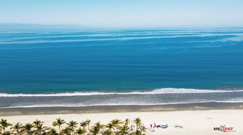 Flamingos Apartment | 6 Person Occupancy 1 Block to Beach Views from Terrace