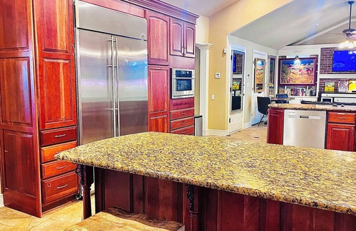 Overland Park House | 6BR Gated Home w Pool & Indoor Hot Tub- Chef’s Kitchen- 1.6 Acres Grand Piano