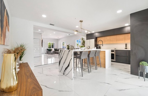 Coral Terrace House | 6BR Ultimate Retreat: Pool, Sports Court & BBQ