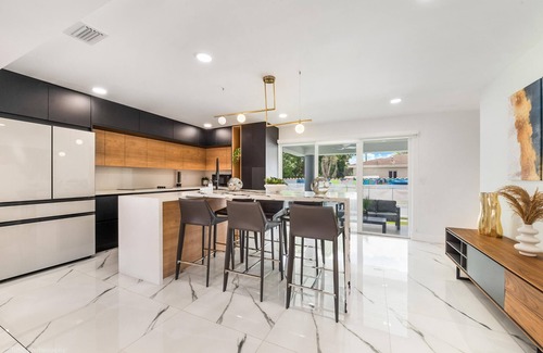 Coral Terrace House | 6BR Ultimate Retreat: Pool, Sports Court & BBQ