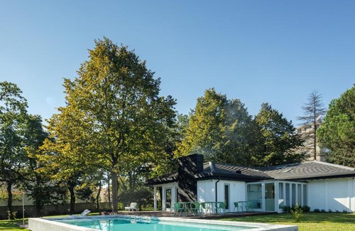 Maia House | 70's wood house
