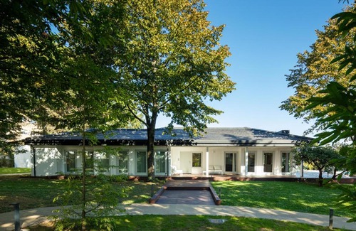 Maia House | 70's wood house