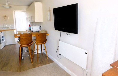 Sheringham Cottage | 73 Beeston Common - traditional brick and flint end terrace cottage has been renovated.