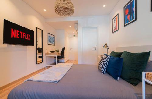 Santo Antonio dos Olivais House | 7Min to Uni Sé-Velha - AC - Work Desk - 300MBs WiFi - Suite 3