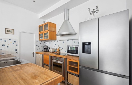 Epinettes Apartment | 80 m² duplex loft-style architect-designed apartment with private garden