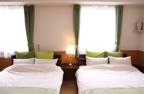 Naka Ward Apartment | 901 A room with a modern taste of healing superv / Nagoya Aichi