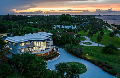Fort Pierce Apartment | 9K SF Waterfront Mansion, Pool, Boat Dock, Theater