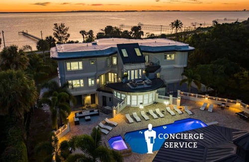 Fort Pierce Apartment | 9K SF Waterfront Mansion, Pool, Boat Dock, Theater