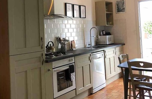 Henansal Cottage | A 2 bedroom gite sleeping 4 plus a cot with access to a heated covered pool.