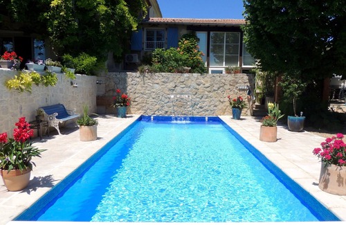Neffies House | A character stone house with private heated swimming pool.