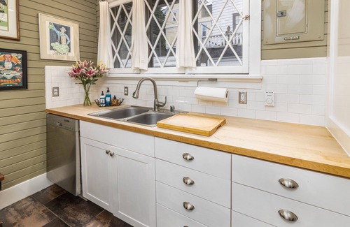 Portage Bay Cottage | A charming little city cottage with backyard chickens awaits your arrival.