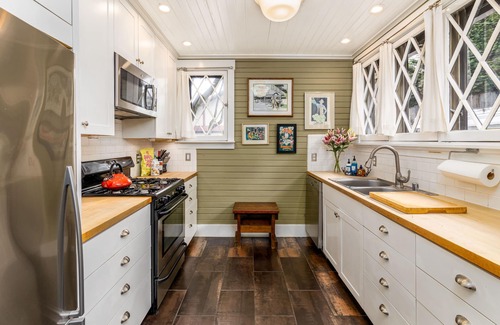 Portage Bay Cottage | A charming little city cottage with backyard chickens awaits your arrival.