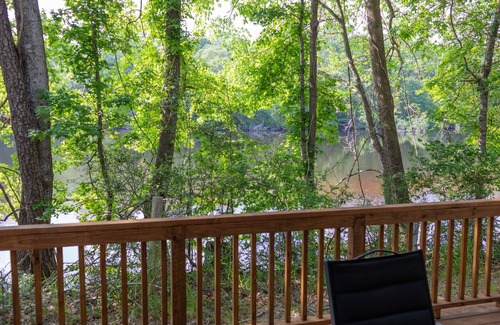 Livingston Cabin | A Cozy ADA Accessible Getaway Right on the Water, Two Creeks Crossing Resort