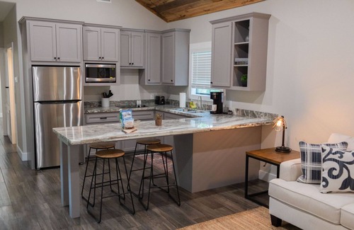 Livingston Cabin | A Cozy Getaway Right on the Water, Two Creeks Crossing Resort