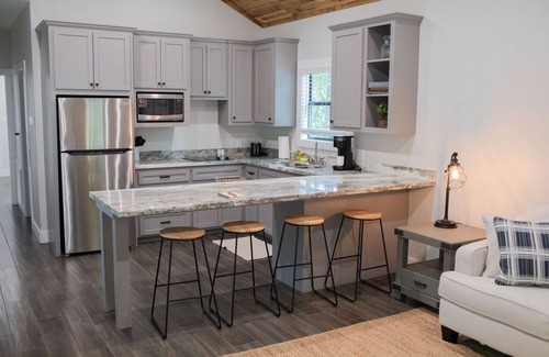 Livingston Cabin | A Cozy Getaway Right on the Water, Two Creeks Crossing Resort