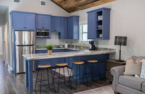 Livingston Cabin | A Cozy Getaway Right on the Water, Two Creeks Crossing Resort