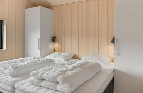 Stege House | A few 100 meters from Råbylille beach, this comfortable vacation home welcomes you.
