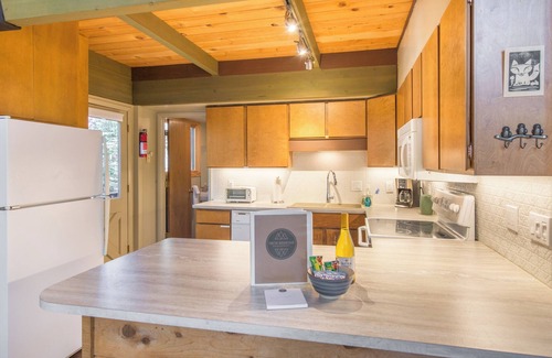 Lake Forest Cabin | A Frame of Mind- filtered lake views, a large deck area, and only a short drive to shores of Tahoe