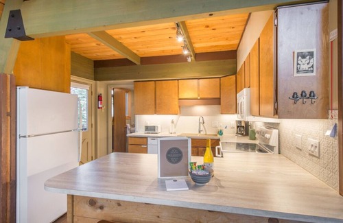 Lake Forest Cabin | A Frame of Mind- filtered lake views, a large deck area, and only a short drive to shores of Tahoe