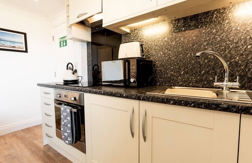 Newport Apartment | A gorgeous coastal apartment for 4 set above Newport Bay