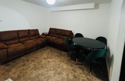 Liverpool House | A larger room with 2 single beds