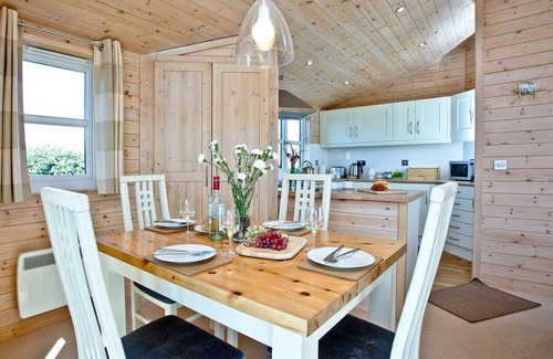 St Merryn Cabin | A light and spacious lodge with one double with walk in wardrobe and en-suite shower and one twin.