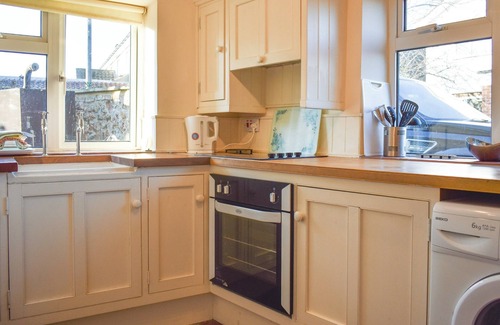 Burnham Deepdale Cottage | A lovely coastal getaway with a wood burning stove.