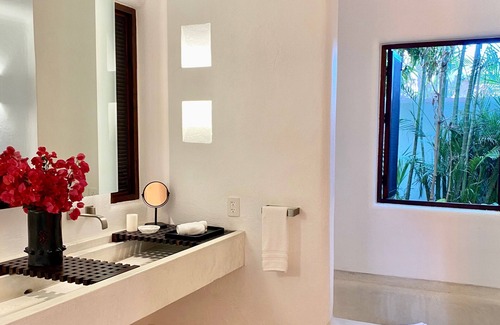 Costa Careyes Villa | A Mexican oasis of artistry + style with private stairs to beach and boat.
