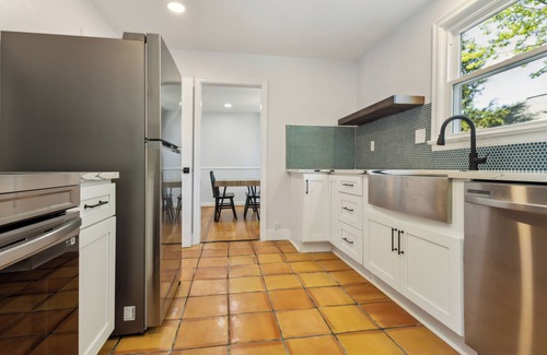 Norfolk Apartment | A Naval Aviator inspired residence adorned with contemporary fixtures. n