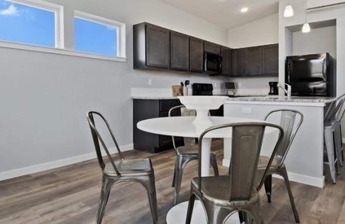 Boise Villa | A park-like setting between the BRAND NEW homes provides a way to relax and meet the neighbors.