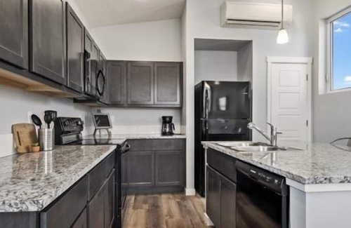 Boise Villa | A park-like setting between the BRAND NEW homes provides a way to relax and meet the neighbors.