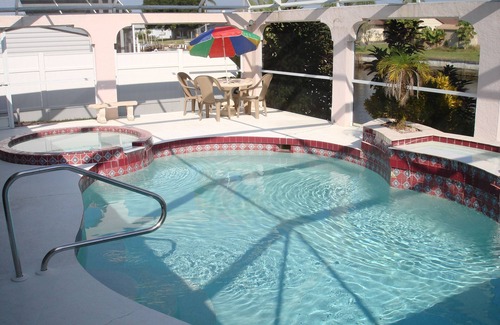 Gulf Cove House | A Piece of Heaven, Waterfront Home, Heated Screened Pool & in Port Charlotte