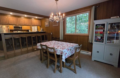 Pocono Pines House | A quaint wooded lakefront home with private beach!